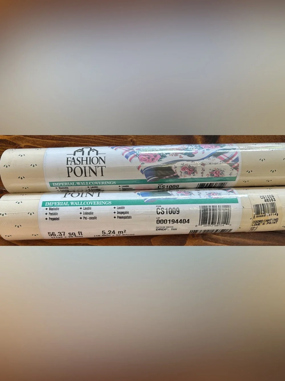Two rolls of vintage wallpaper cream and dark green